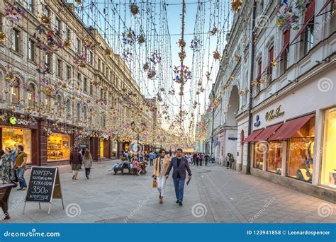 Locals And Tourists Enjoying A Decorated Street In Downtown Moscow The