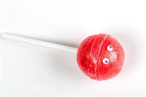 Red Lollipop With Eyes On A White Background Creative Commons Bilder