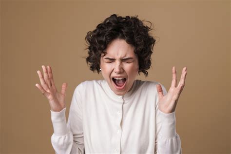Premium Photo Furious Brunette Woman Screaming With Throwing Up Hands