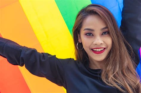 Premium Photo Portrait Lgbt Asian Women Happy Smile With Lgbtq Rainbow Flag Background