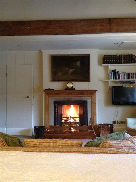 Our luxury properties immerse guests in the finest of amenities and finishes, while giving visitors the true sense of living like a local. Open fire in cosy bedroom. The Inn at Whitewell, Forest of ...
