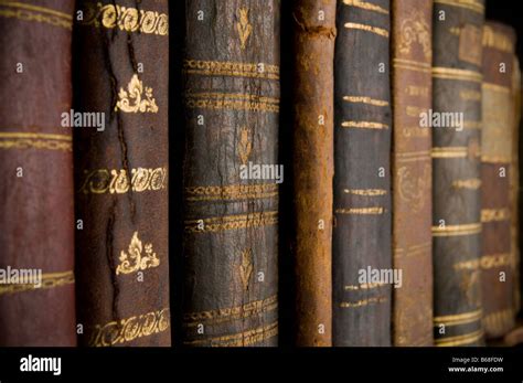 Very Old And Dusty Books Spine In A Row Stock Photo Alamy