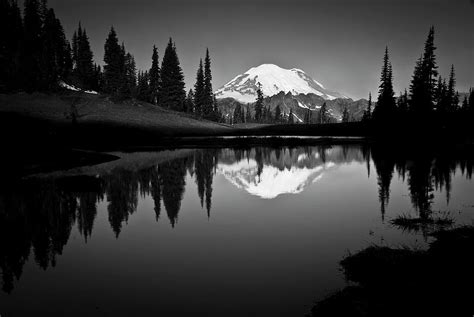 Reflection Of Mount Rainer In Calm Lake Photograph By Bill