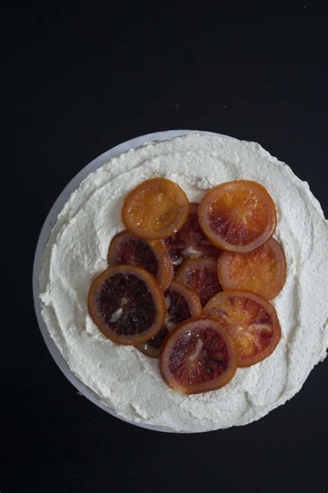 black sesame sponge cake with blood orange buttercream and candied