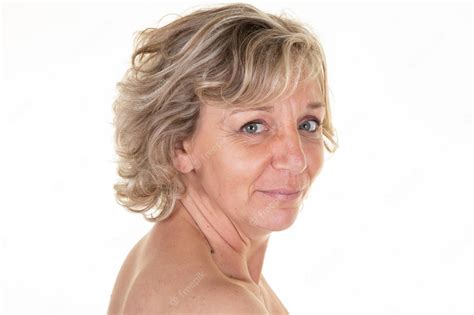 premium photo nude portrait of beautiful mature woman senior over white background closeup