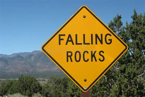 Falling Rocks Ahead Road Sign Stock Photo Image Of Caution Nature