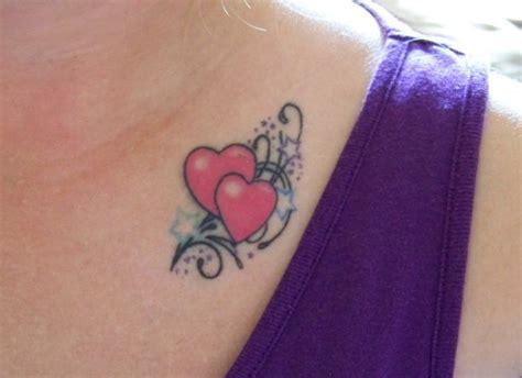 Lines ascending the wearer's calves end with heart symbols. heart tattoo | Tattoos for women, Heart tattoo designs ...