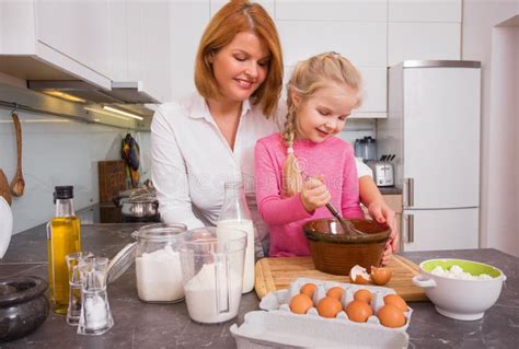 Mother And Daughter Cooking In Kitchen Stock Image Image Of Mixing Daughter 65012319