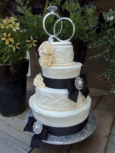 Not only is a white wedding cake the most traditional of cakes, it fits all wedding styles: Black And Ivory Wedding - CakeCentral.com
