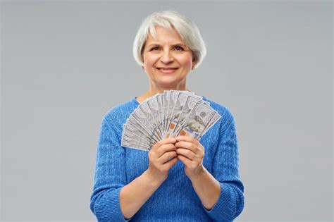 463 Old Woman Holding Dollar Cash Money Stock Photos Free And Royalty