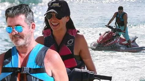 simon cowell and lauren silverman have fun in the barbados sun riding jet skis and topping up