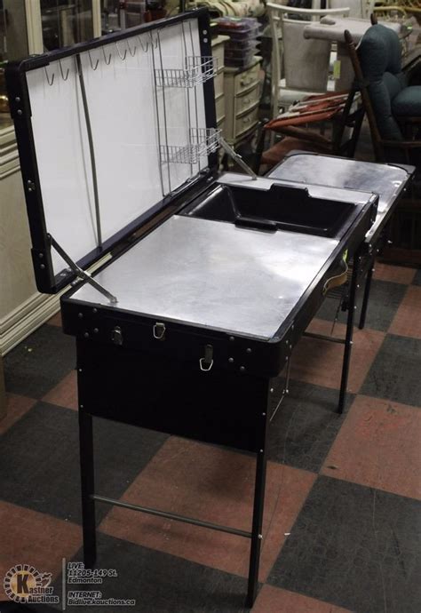 You want one that's highly functional, durable, and roomy, not to mention attractive. PORTABLE DELUXE CAMP KITCHEN WITH SINK