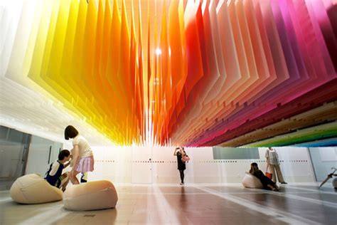 > look at the drawing of the logo, object, or character, choose a color, and tap to color in. 100 Colours installation by Emmanuelle Moureaux