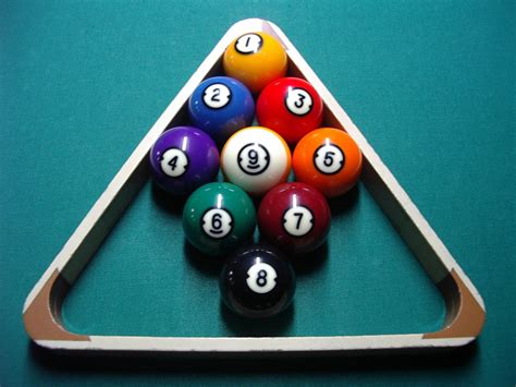 Racking The Balls In Pool 9 Ball The Lucky Mans Game Hubpages
