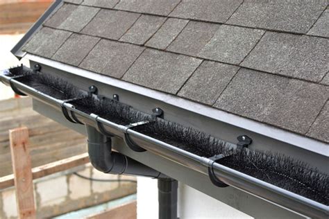 Mark where the downspouts should go and make appropriate holes for the downspout outlets on your gutter. How Installing DIY Gutter Guards Can Save Your Roof and Your Sanity