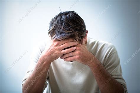 Depressed Man Holding His Head In His Hands Stock Image C0342990