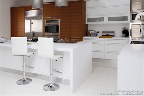 The chequered black and white floor determined the monochromatic palette of this new kitchen in a with this in mind, the designer created a long island opposite the cooking centre, and * two sinks means two workstations, although you can have even more people working in a kitchen with. Stone of London - Pictures of Kitchen Countertops