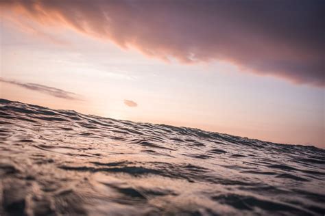 Download Calm Waves At Sunset Royalty Free Stock Photo And Image