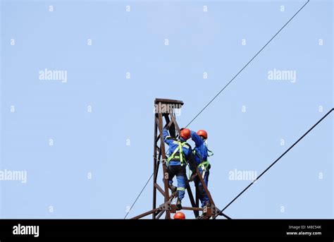 Silhouette Electrician Work Installation Of High Voltage In High