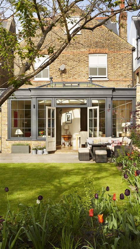 This Striking Orangery Extension Sits Comfortably At The Rear Of This