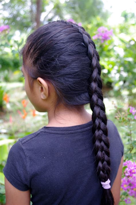 How about the good old fashioned braided bun? Braids & Hairstyles for Super Long Hair: Micronesian Girl ...