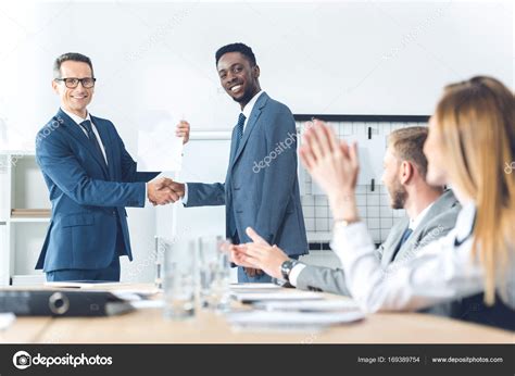 Boss Shaking Hand Of Manager — Stock Photo © Arturverkhovetskiy 169389754