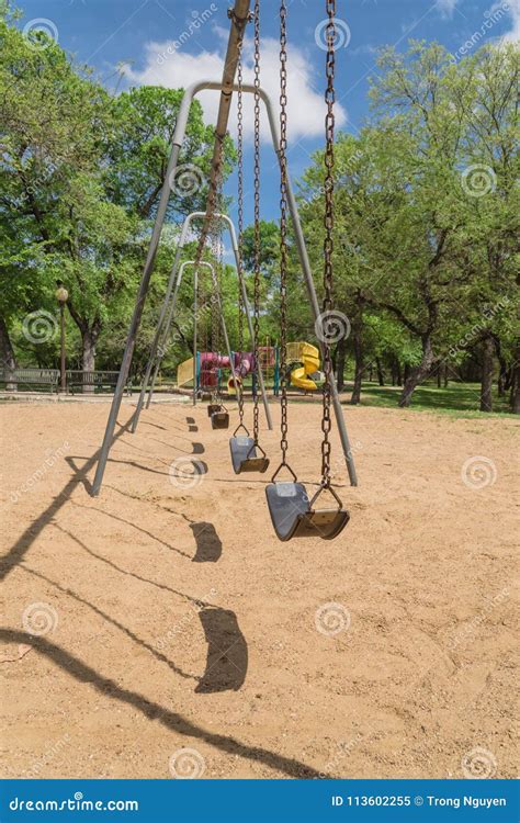 Huge Swing Set In Nature Park With Tree Lush At Ennis Texas Us Stock