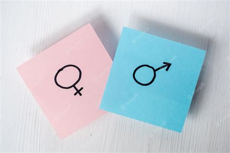 pegatinas con símbolos de género venus y marte indican hombre y mujer sobre fondo blanco foto