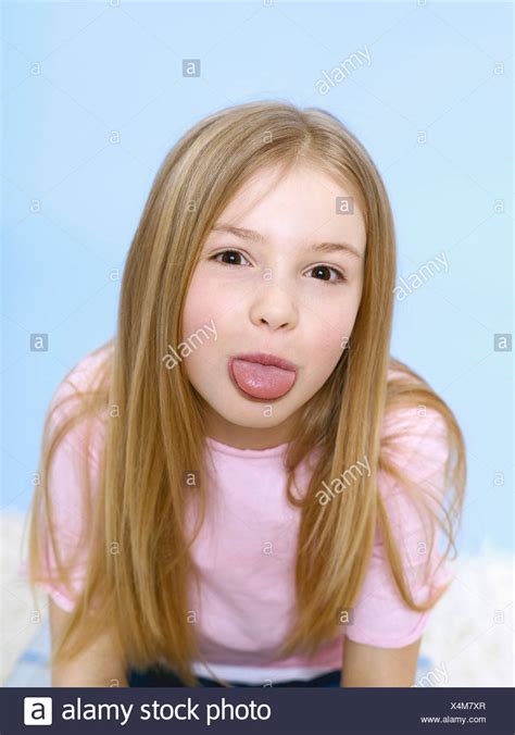 Teenage Girl Sticking Tongue Out Stock Photos And Teenage Girl Sticking