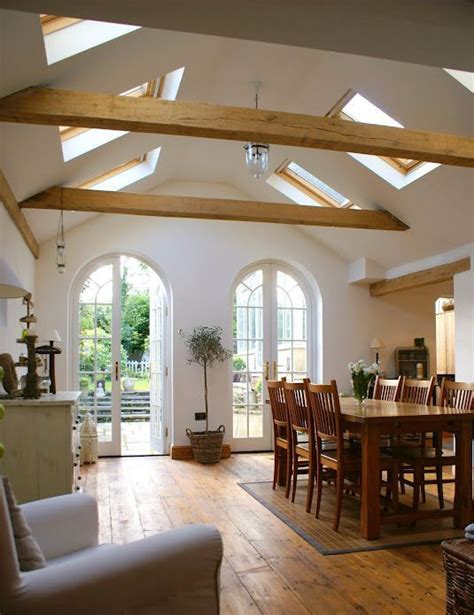 Beams of light ana white. 25 Vaulted Ceiling Ideas With Pros And Cons - DigsDigs