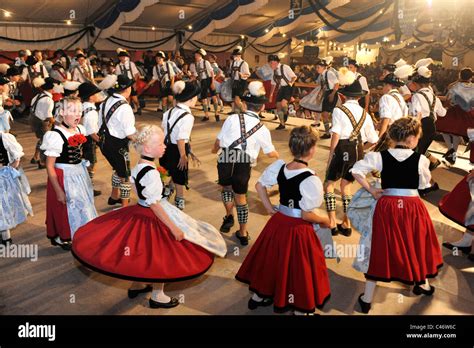 Dancer In Traditional Costumes Show The Famous Dance Schuhplattler In Bavaria Germany Stock