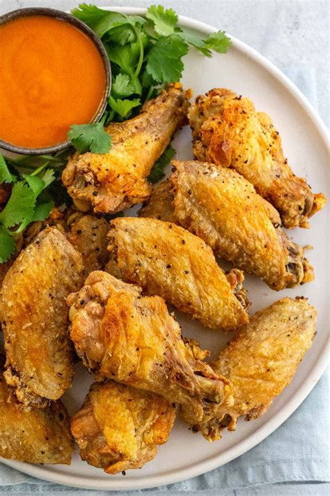 Grilled chicken and baked chicken have a similar nutritional value. Baked Chicken Wings - Jessica Gavin