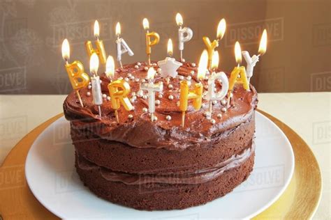 On her birthday on wednesday, here's glimpse at her career. A chocolate birthday cake with lots of candles - Stock ...