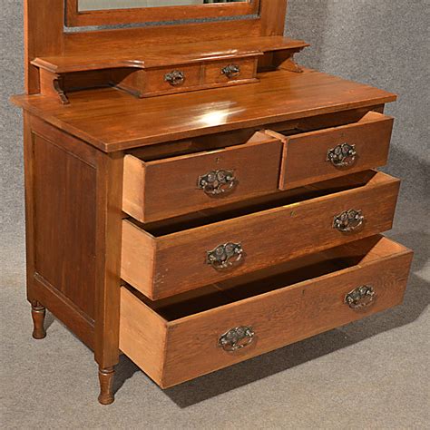 You could place it inside your base, next to your bed. Antique Oak Dressing Table Vanity Chest Of Drawers ...