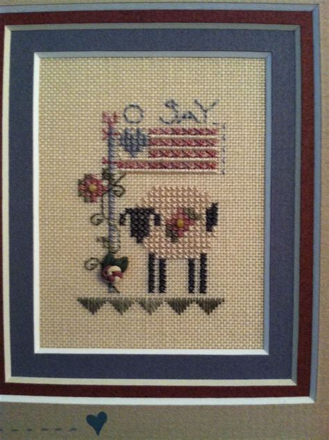 Pin by Nancy Blaylock on My sisters cross stitch & other things she's made | Sheep cross stitch 