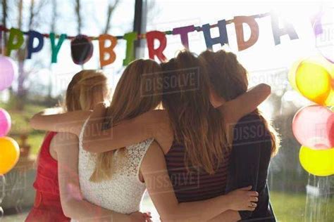 Four Teenage Girls Celebrating Birthday Stock Photo Dissolve