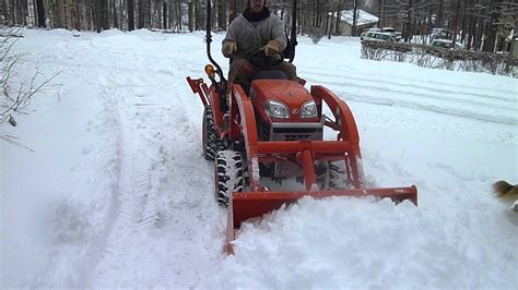 Kubota Bx25d Snow Plowing Youtube