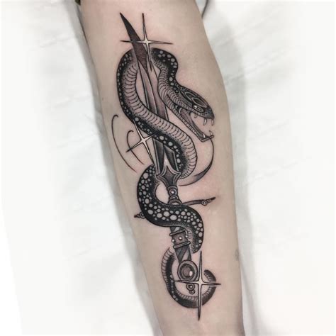 Share 75 Sword And Snake Tattoo Latest Esthdonghoadian