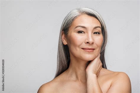 Beauty Portrait Of An Attractive Mature Topless Woman Stock Photo