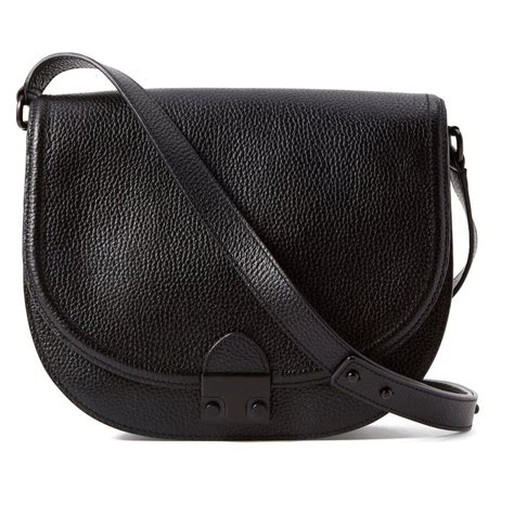 In Structured Supple All Black Leather This Crossbody Saddle Bag Is