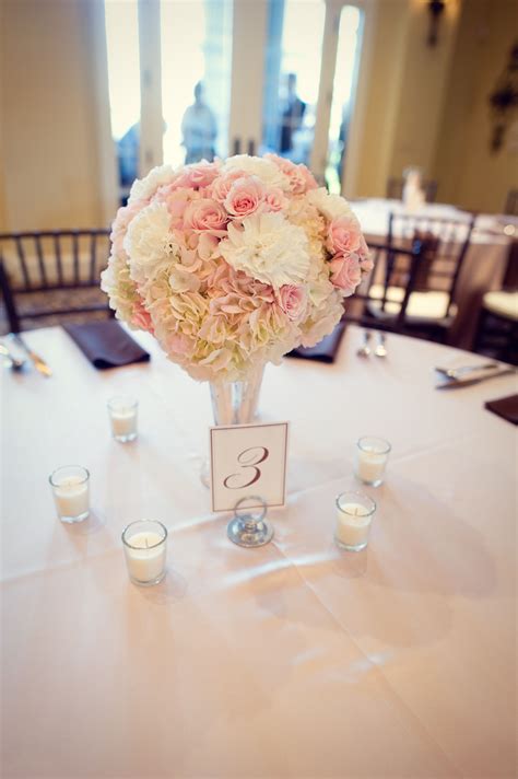 blush and ivory rose and carnation centerpiece