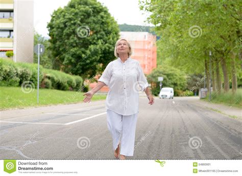 Senior Woman In All White Walking At The Street Stock Image Image Of