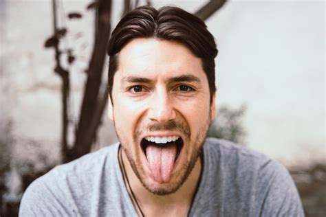 Man Showing Tongue Free Photo