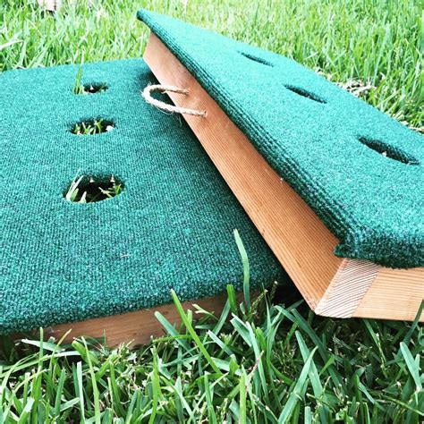 The game field consists of two washer pits, each containing one recessed cup of 4 inches in diameter. 3 Hole Washer Toss Boards (8 Washers Included) - Play ...