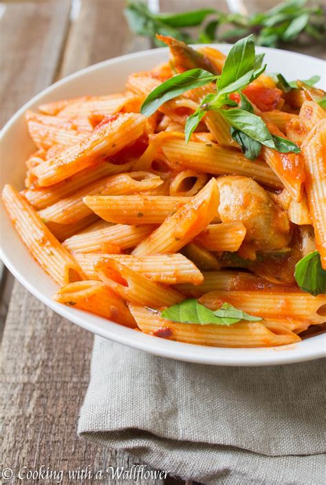 penne in spicy marinara sauce with fresh asparagus