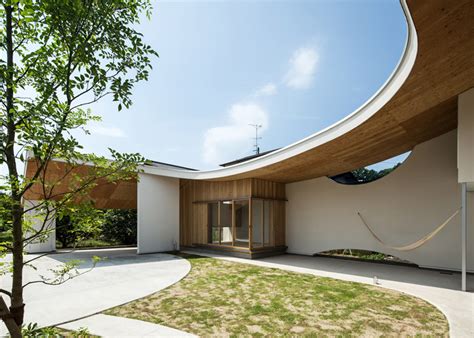 Ym Design Offices Shawl House Has A Roof That Shelters A Tea Room