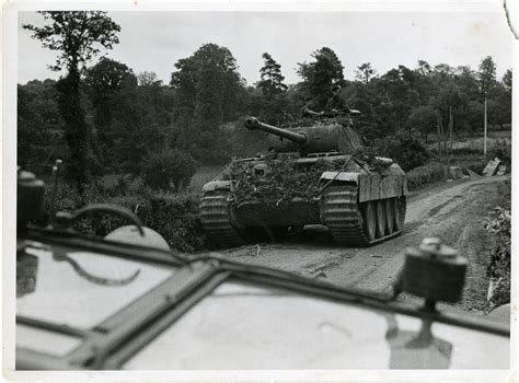 German Panther Tank And Crew Moving Through Countryside Normandie