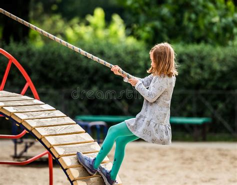 Child Climbing With Rope On Playground Stock Photo Image Of Outdoor