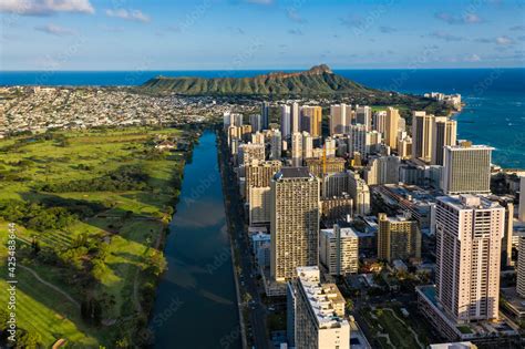 Aerial View Of Waikiki District And Diamond Head Mountain At Sunset