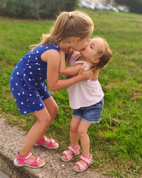 Adorable Sisters Kissing Each Other Cute Little Girl Dresses Little